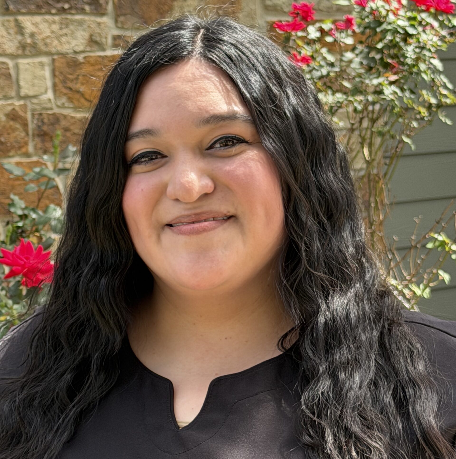 Delann Thompson, business manager, wearing a black shirt at East Texas Children's Dentistry in Mt. Pleasant, TX